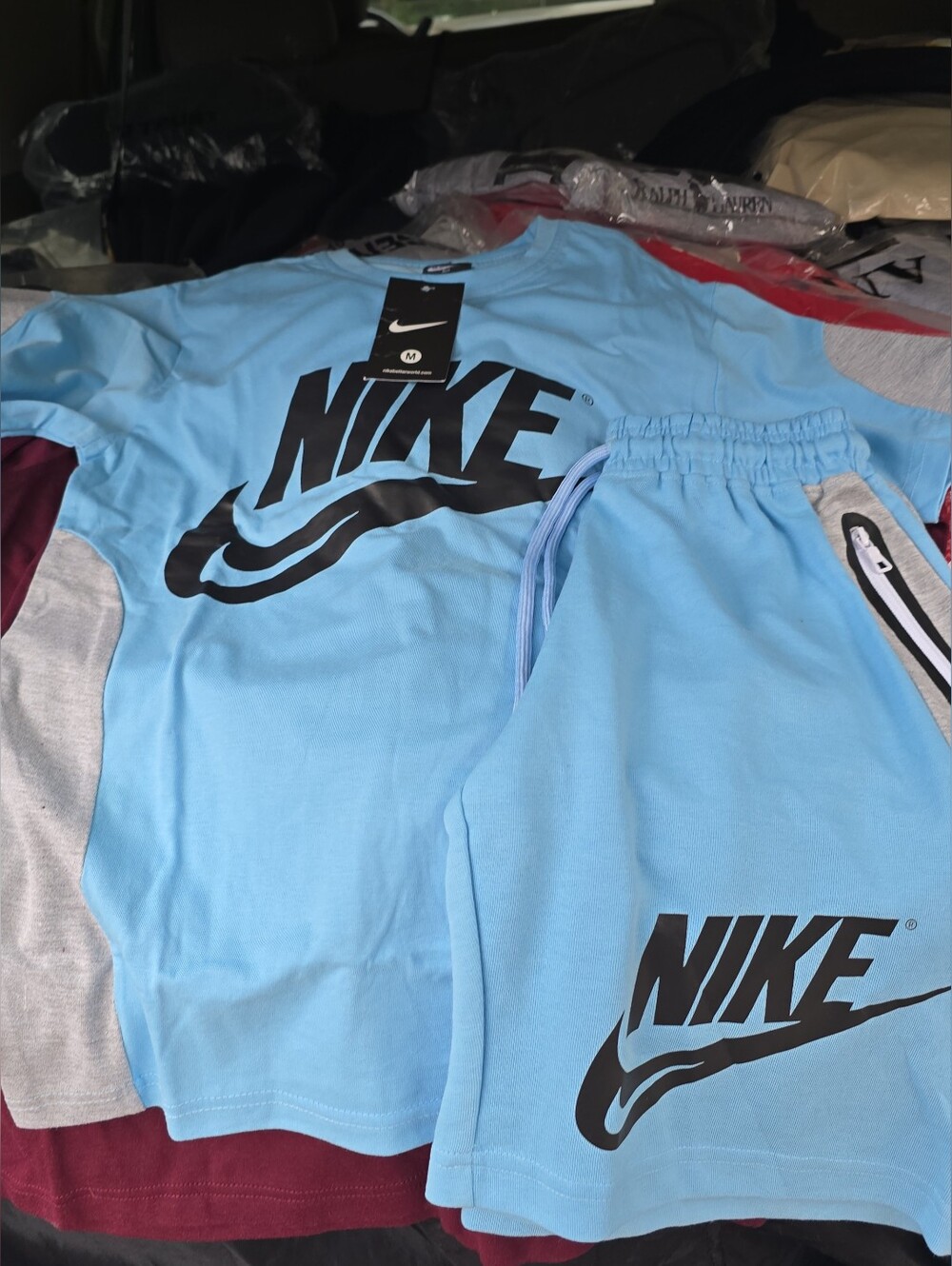 Nike Sky Blue Tee and Shorts Set with Black Logo